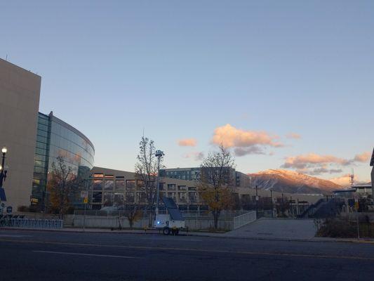 The central library at sunset with the mountains