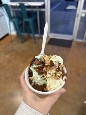 Half pistachio half cake batter with cone bits and chocolate cookie