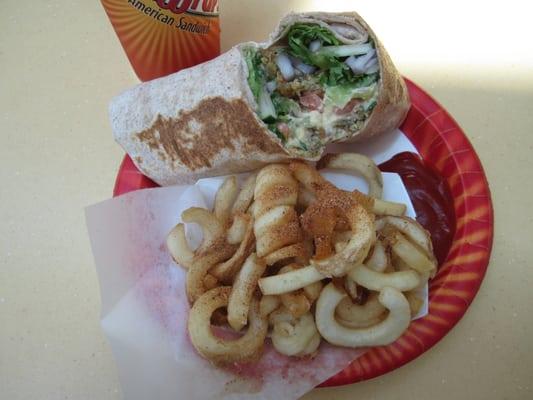 Falafel hummus wrap with "Kurly" fries.