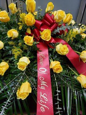 Closer view of casket arrangement