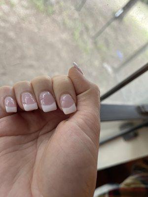 French tip dip nails. Got them done 4 days ago and they are already chipping. Top coat is chipping off and top of all nails is rough.