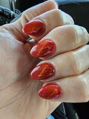 Beautiful almond shaped cat eye effect gel nails