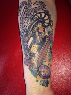 This beautiful tattoo was done by Pym. I've been wanting a vintage sewing tattoo for years. Pym designed this tattoo. I love it.