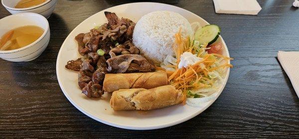 #36: Rice w/ crispy egg rolls & charbroiled pork ($13)