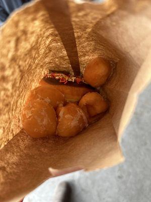 $10 for two sprinkle donuts and 1 dozen donut holes (split between two kids)