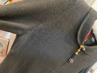 This is the jet black cashmere sweater that was ruined by Royal Cleaners.