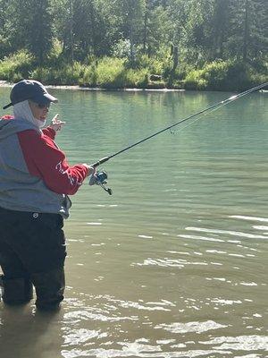 Salmon fishing with bear observer