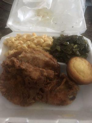 Fried turkey chops with Mac and cheese and collard greens and cornbread muffin