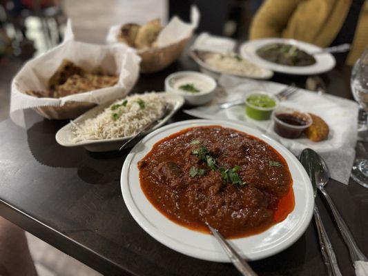 Lamb Curry with paratha and Palak Paneer with naan