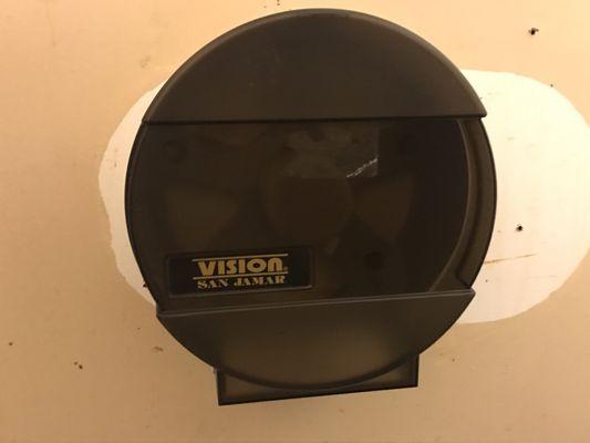 empty toilet paper dispenser