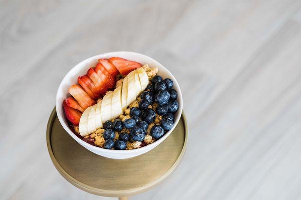 OG Acai Bowl - Organic Acai topped with vanilla almond granola, fresh strawberries, blueberries & bananas + honey drizzle.