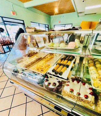 Beautiful display case of baked goods.