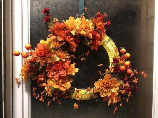 Fall wreath I made for about $10 all with Dollar Tree items