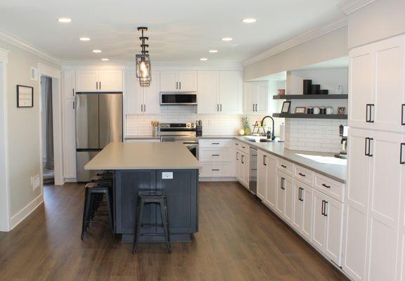 This remodeled kitchen invites connection.  Whether it's family  or entertaining friends, this kitchen is designed for creating memories.