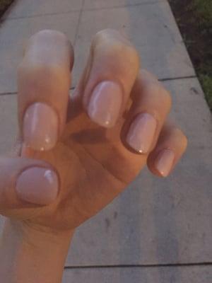 Acrylic manicure with OPI polish. Perfectly done to my request for natural-looking, rounded nails