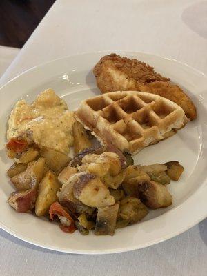 Breakfast potatoes, chicken and waffles, and shrimp and grits