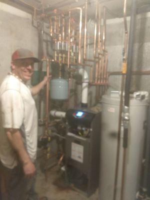 Sean with the recently installed boiler