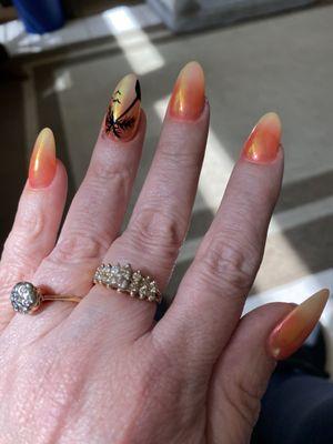 Sunset nails with palm tree by Hailee.