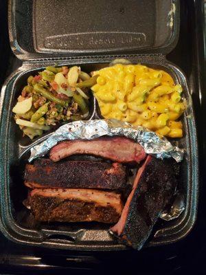 1 meat plate $15.  Ribs, macaroni & cheese and green beans.