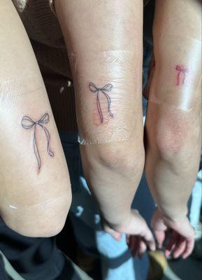 Matching bow tattoos - each one took about 10 minutes max