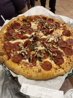 Pepperoni and mushroom pizza