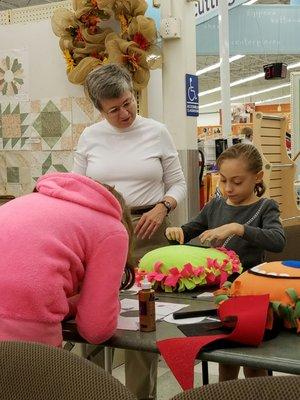 Having fun at the class making goofy no sew pillows!