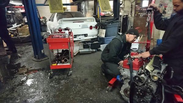 Inside the workshop, R32 in the background.