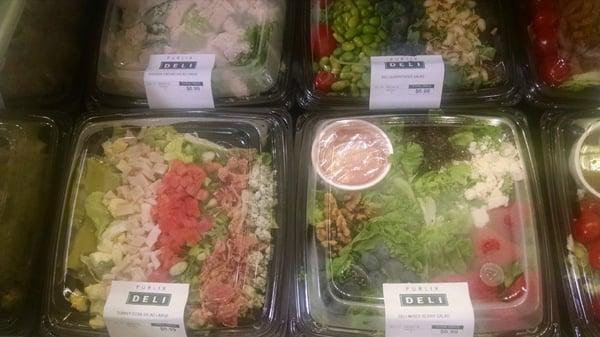 A variety of different types of salad.