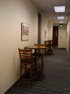 Seating in the hallway near the third and fourth classrooms.