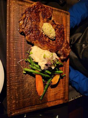 Steak, potatoes and fresh vegetables. Steak didn't need a knife. So tender.