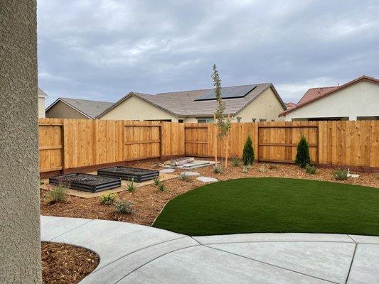 Back yard with pad for shed