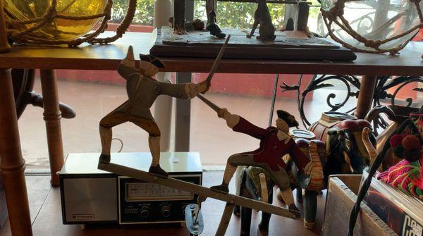 Sword-fighting kinetic sculpture.