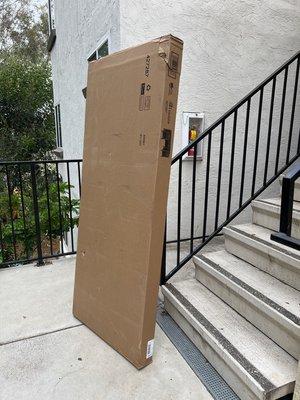 Scumbag delivery guy left package like this