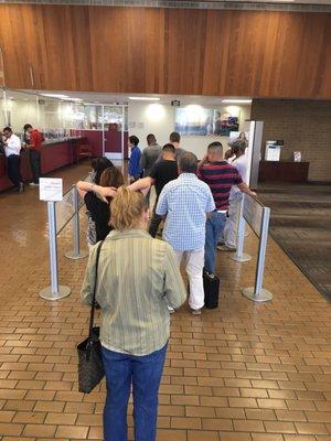 45 min and still 2 cashiers the rest of the employees sitting around not even asking deposit cash or other.. Wells Fargo has better service