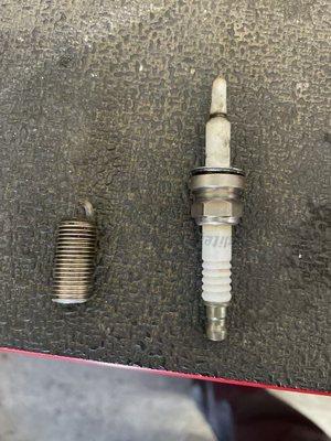 Spark Plug and extracted part from inside of the Cylinder