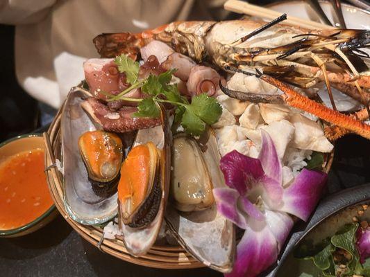 Steamed seafood over rice