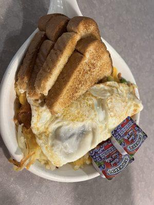 Two eggs over easy with wheat toast, and hash browns.