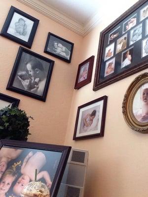 Cute baby pictures on wall. But you don't have to be prego to be her patient!