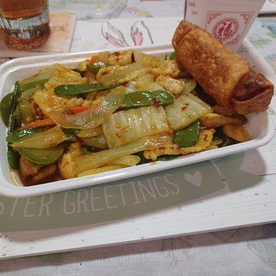 Curry chicken and an egg roll.