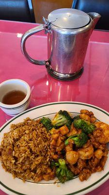 Chicken and shrimp with fried rice. Hot tea.