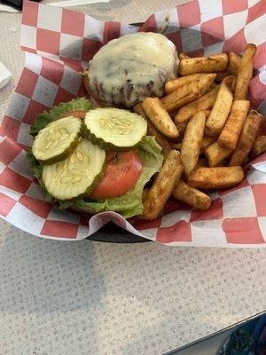 1/2 lb cheeseburger cooked medium in a Kaiser roll with fries