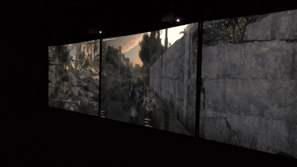 Feel the ultimate zombie experience on our massive simulator screen, 32 ft wide x 7 ft high