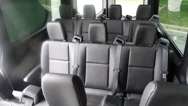 Our sprinter is such amenities as individual seat cup holders, multiple cell phone charger outlets, TV screen