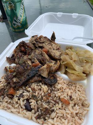 Jerk chicken cabbage rice and beans