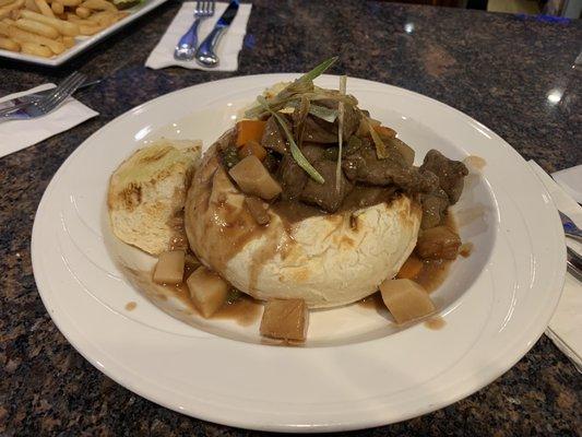 Beef stew in a toasted bread bowl - specials menu