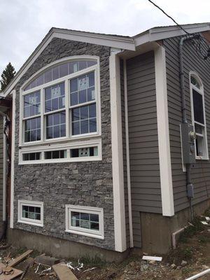 Harvey triple window with stonework installed