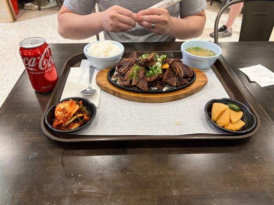 LA Galbi with rice , soup, and banchan( kimchi and jangajji)).  So good! Loved the scallions on top!  Located in the food court in HMART