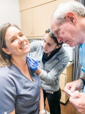 Dr.'s Kiener and Dilger give our aesthetician Janelle a little TLC!