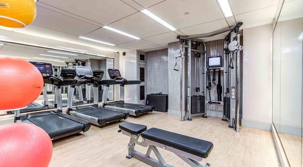 Fitness Center featuring treadmills, weight machines and more.