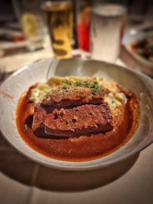 Beef brisket with mashed potatoes. Yum!